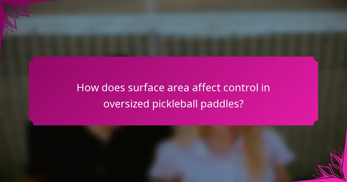 How does surface area affect control in oversized pickleball paddles?