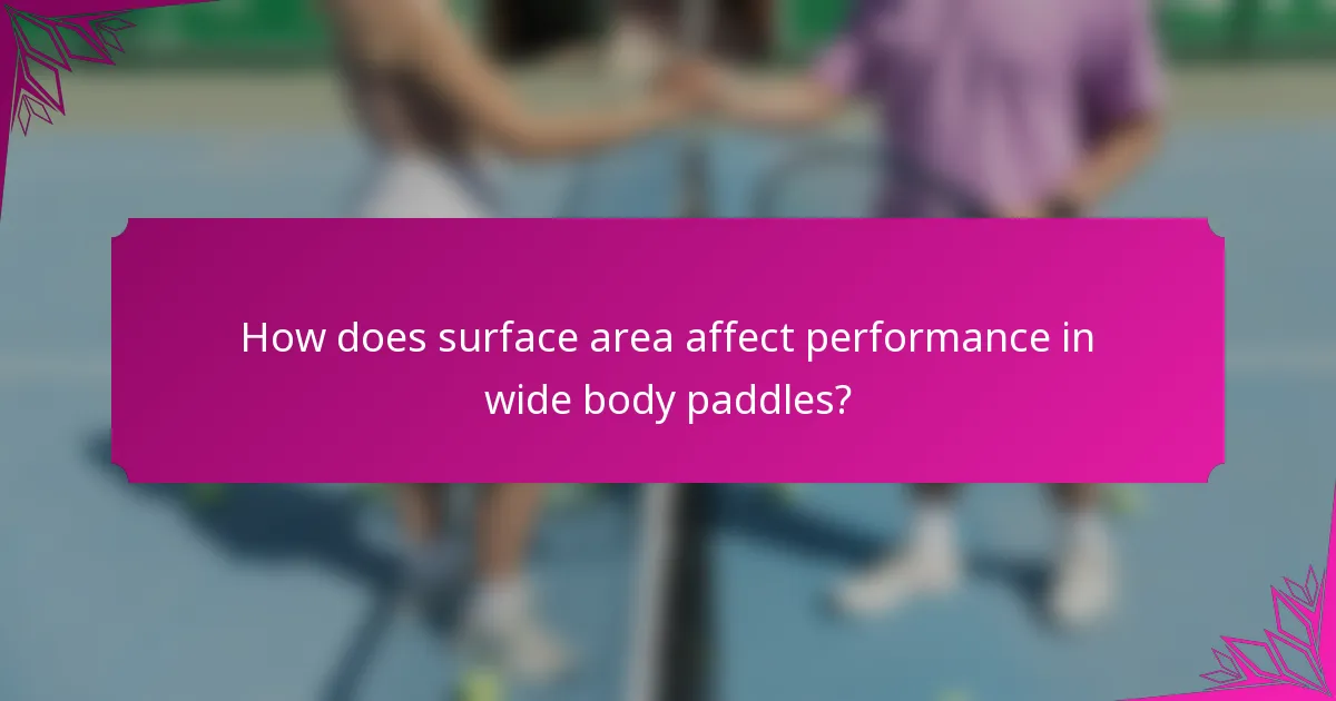 How does surface area affect performance in wide body paddles?