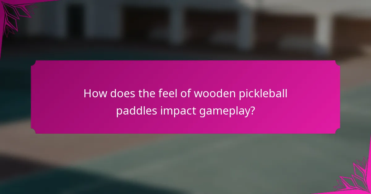 How does the feel of wooden pickleball paddles impact gameplay?
