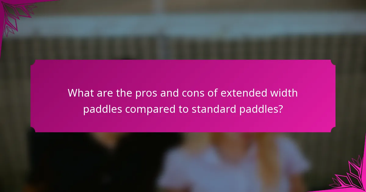 What are the pros and cons of extended width paddles compared to standard paddles?