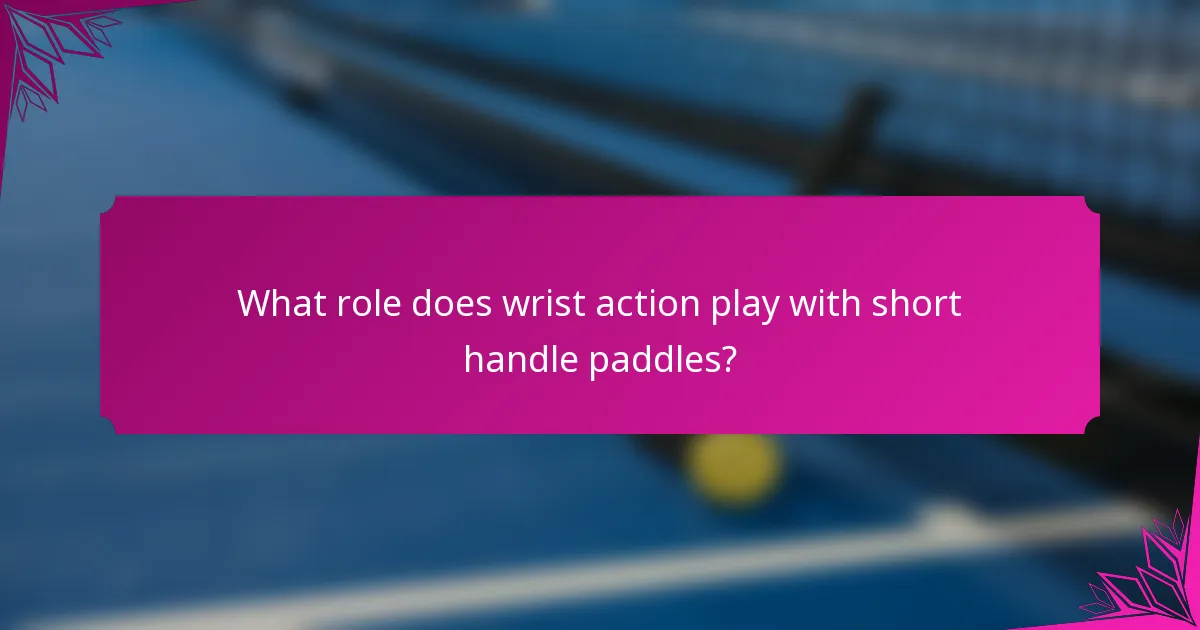 What role does wrist action play with short handle paddles?